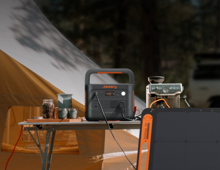 Manufacturer camping scene with Jackery Explorer 1000 v2 and accessories